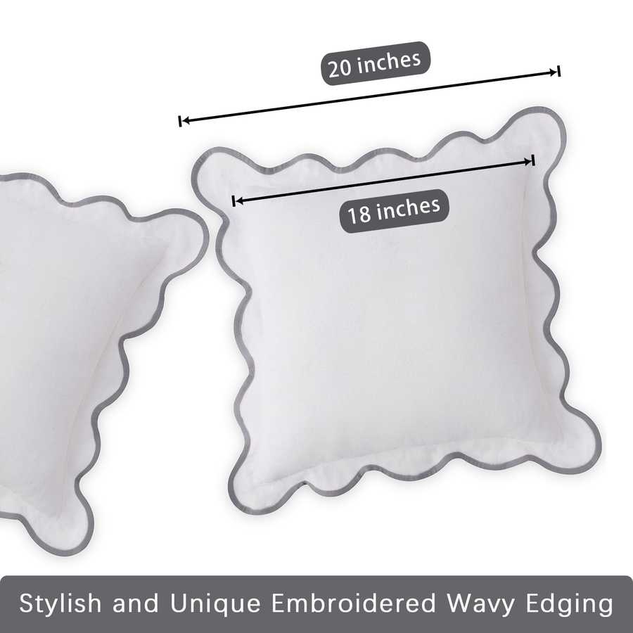 Two decorative pillows with wavy edges and measurements on a white background