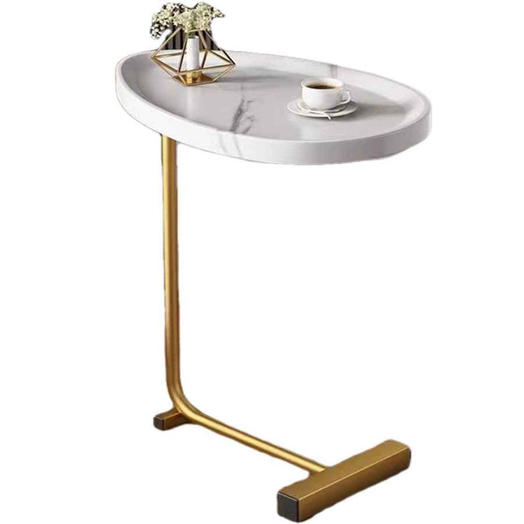 Small round table with marble top and gold metal legs on a white background