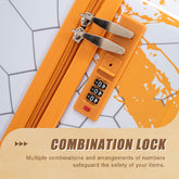 Orange suitcase with a combination lock on a textured surface