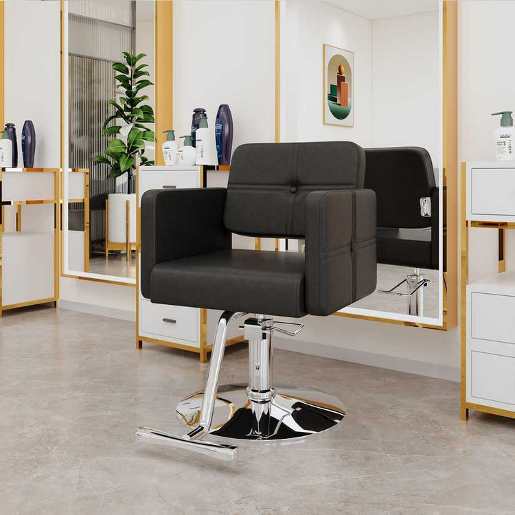 Salon station with mirrors and bottles in stylish interior