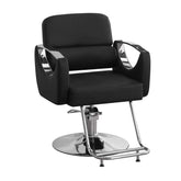 Black salon chair with chrome accents on a white background