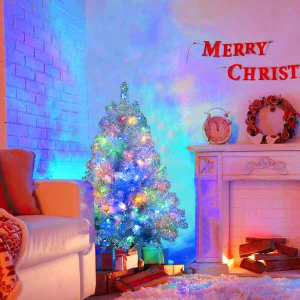 Decorated Christmas tree in a living room with a &