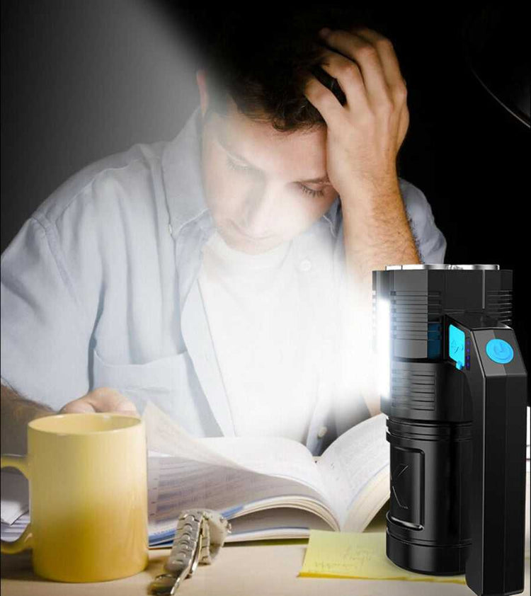 Compact USB Rechargeable Handheld LED Flashlight used as a reading light, showcasing its versatile indoor functionality.
