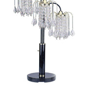 Table lamp with crystal accents on a white background