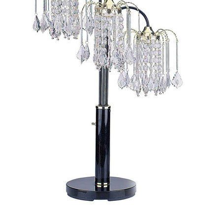 Table lamp with crystal accents on a white background