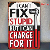 Metal sign with humorous text and wrench graphic on a white background