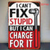 Metal sign with humorous text and wrench graphic on a white background