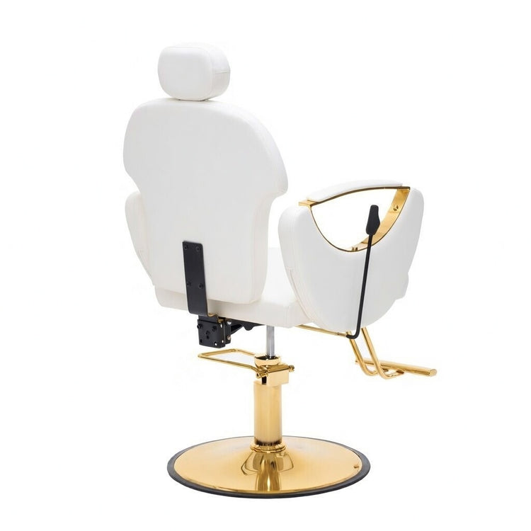 A modern barber chair with a white upholstered seat and headrest, supported by a polished gold hydraulic base with a round footplate.