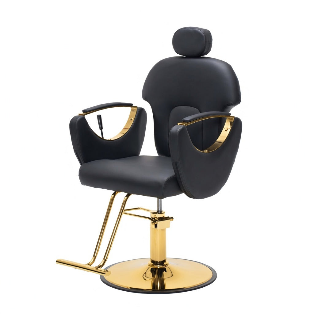 A modern barber-style salon chair with black padded upholstery and polished gold metal base, arm accents, and support legs, shown on a plain white background.