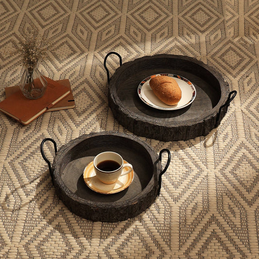 Cenecharl Mango Wood Decor and Serving Tray set displayed with coffee and bread, showcasing rustic round mango wood design with metal handles.