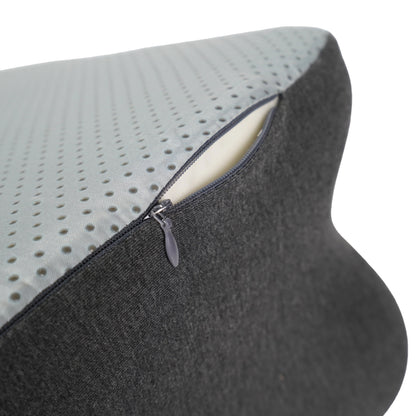 Detail of zippered cover on Ergonomic Memory Foam Bed Pillow revealing breathable memory foam interior for enhanced spinal support and hygiene.