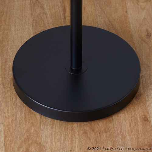 Close-up of a matte black circular base and central pole on a light brown wood floor, with a small LumSource copyright watermark in the lower right corner.