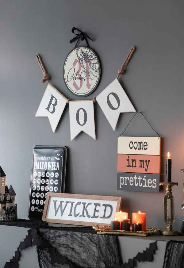 Halloween circle sign with spiderweb and October 31, paired with &