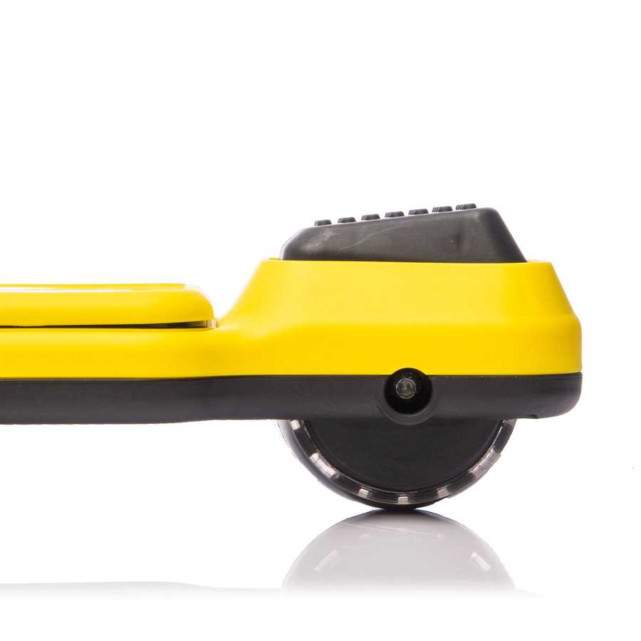 Close-up of yellow scooter wheel with flashing lights for kids' outdoor riding