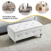 White tufted bench with decorative buttons in a living room setting, suitable for various rooms.
