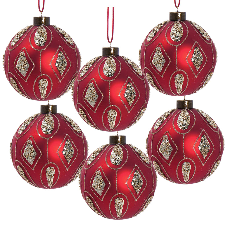 Set of red Christmas ornaments with gold patterns on a white background
