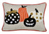 Decorative pillow with Halloween-themed pumpkins on a beige background