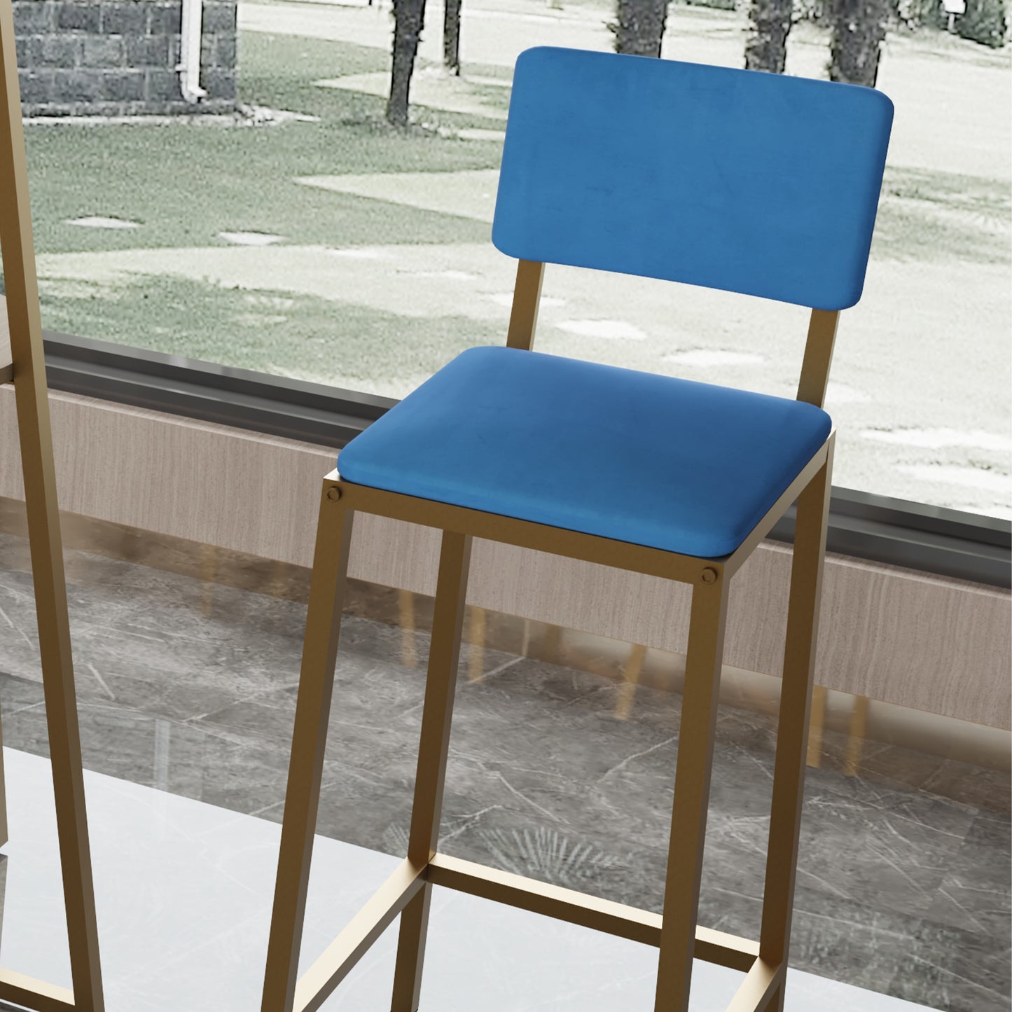 Close-up of blue cushioned bar stool with gold frame, part of the Bar Table and Chairs Set, ideal for stylish dining spaces.
