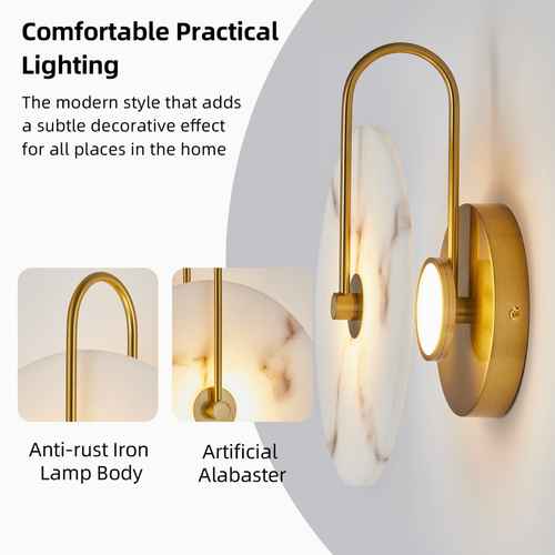 A wall-mounted sconce with a curved gold-toned metal arm and a round white-and-gray marble backplate, shown lit against a light gray wall. Text on the left reads &