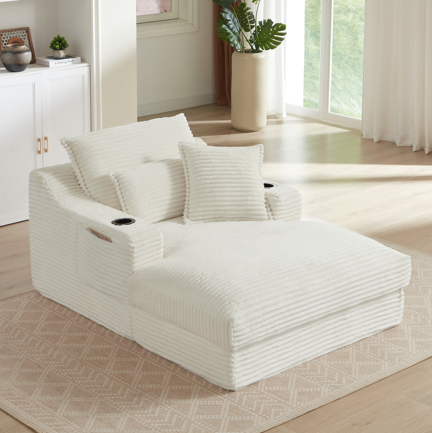 White textured sofa in a bright living room with large windows.