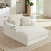 White textured sofa in a bright living room with large windows.