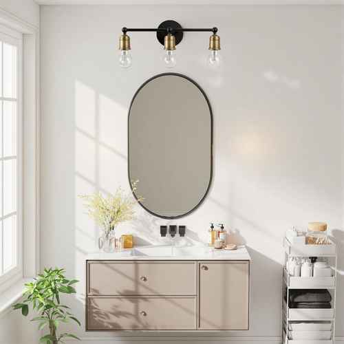 A modern bathroom vanity scene with a wall-mounted oval mirror, three-light wall sconce above, a beige floating cabinet with a white countertop, and toiletries on a white shelving unit.