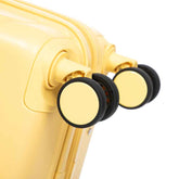 Yellow ABS spinner suitcase with four black wheels and matching yellow handle, lightweight and stylish travel luggage