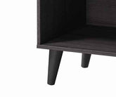 Close-up of the black wooden leg of the TV stand, showcasing tapered design and sturdy construction