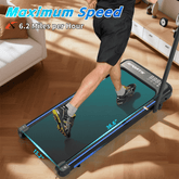 Close-up of a person walking on a compact foldable treadmill with digital display, measuring 36.6 inches by 15.2 inches, in a cozy home setting