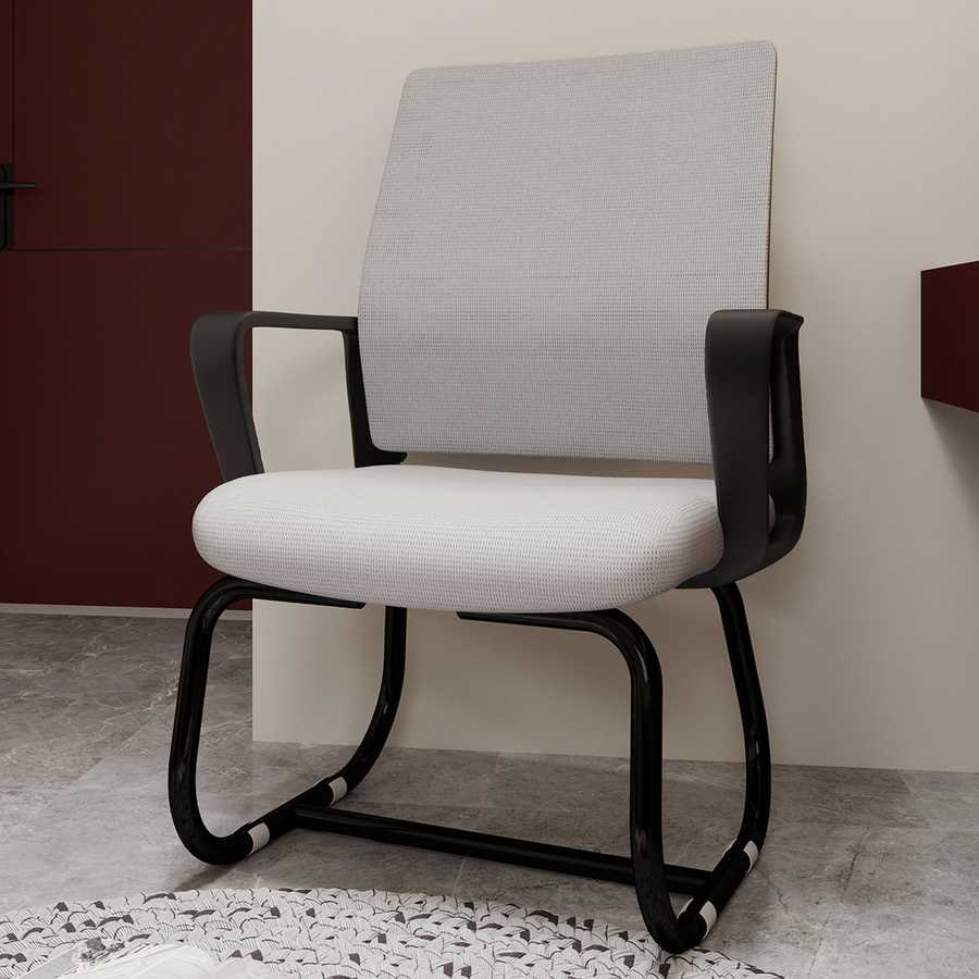Modern office chair with black frame and gray cushion against a neutral wall.