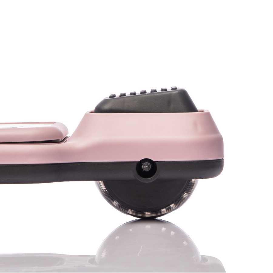 Pink kids' scooter with flashing wheels and LEGO-style building blocks