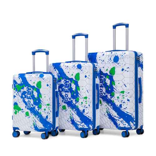Three-piece hardshell luggage set in white with blue and green paint splatter and hexagonal patterns, featuring blue handles and wheels.