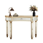 Front view of Half-Moon Mirrored Console Table with fluted glass and gold accents, styled with books and floral decor.