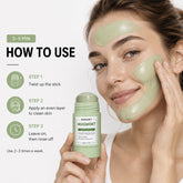 A woman applies a light green mud mask to her face while holding a stick of BARIJST Mugwort face mask cleaner. The image includes a &