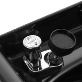 Close-up of a black and chrome gas valve on a stove
