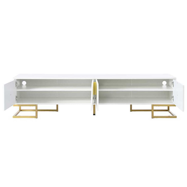 Open view of entertainment center showing interior shelves and cable holes, designed for efficient media storage and connectivity.