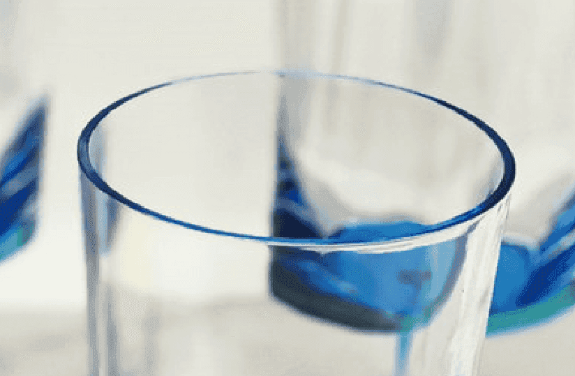 Close-up of the rim of a LeadingWare unbreakable wine glass, showcasing smooth BPA-free acrylic construction in a modern blue design.