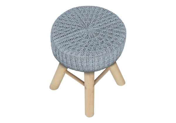 Round stool with knitted blue top and wooden legs on a white background