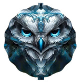 Artistic depiction of an owl with blue eyes and a geometric pattern on a white background