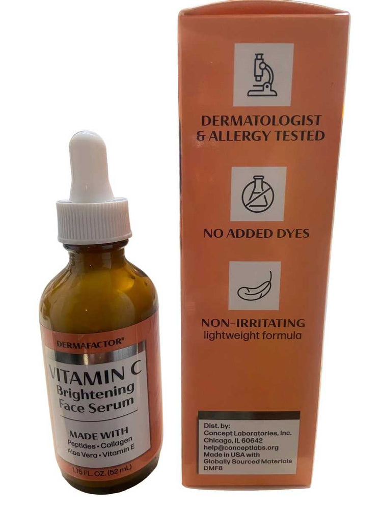 Bottle of vitamin C serum with a dropper on a blurred background