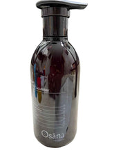 Bottle of Osana Cucumber skincare product on a surface
