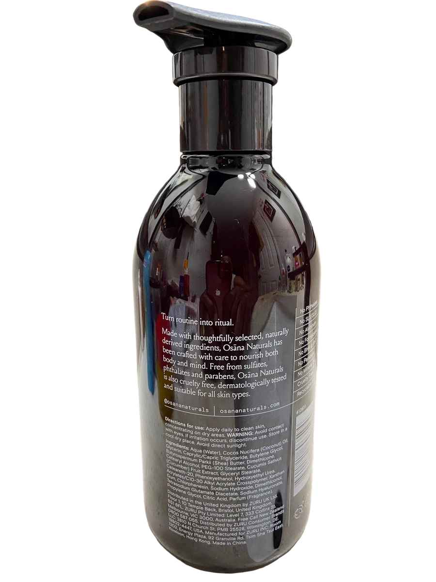 Bottle with a pump dispenser on a textured surface