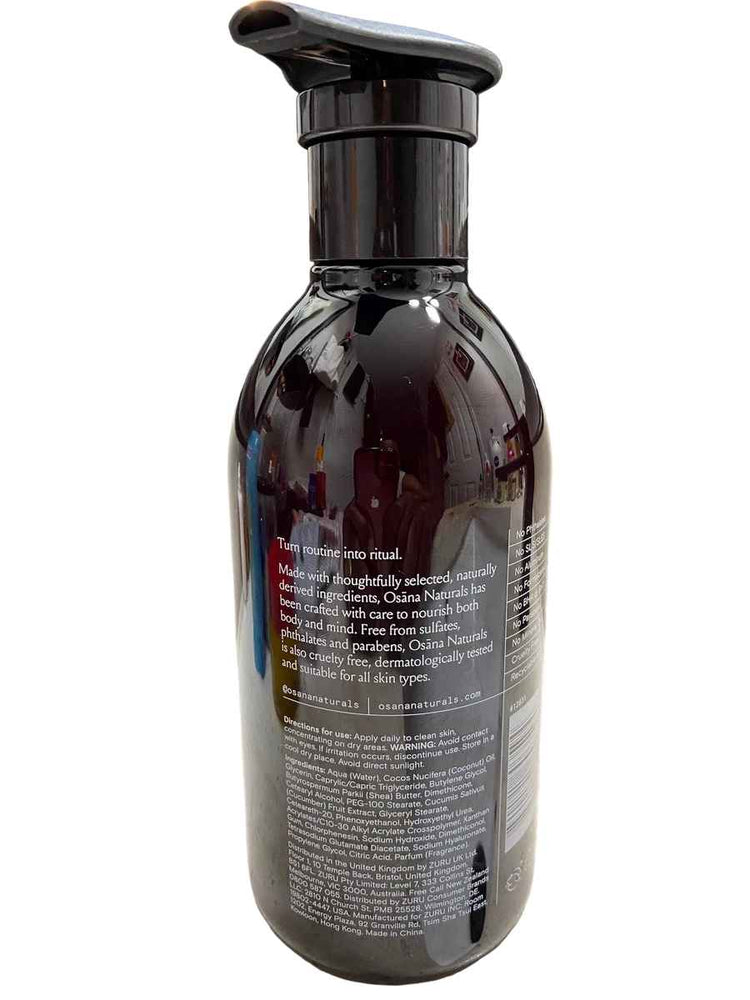 Bottle with a pump dispenser on a textured surface