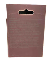 Back of a product packaging with text on a concrete surface