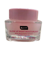 Pink jar of skincare product on a textured surface