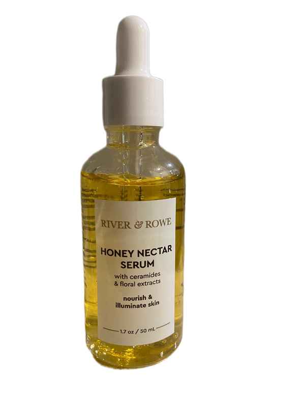 A 1.7 oz glass dropper bottle of River & Rowe Honey Nectar Serum, filled with golden-yellow liquid and featuring a white label and white dropper cap, set against a plain white background.