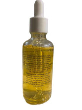A clear glass dropper bottle filled with golden yellow oil, featuring a white plastic dropper cap and black printed text on the back, isolated on a white background.