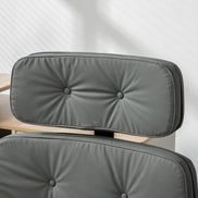 Gray cushioned office chair with a white background