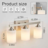 A three-light wall sconce with a brushed silver metal bar and frosted white glass shades, shown with overlaid dimension labels and icons indicating product size and compatibility.