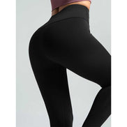 Close-up of MLNshops MT20 black yoga leggings highlighting high waist and body-contouring fit for enhanced flexibility and support.